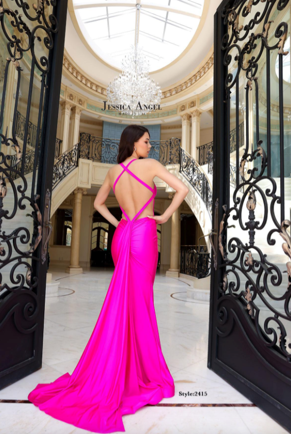 Back view of model in a Jessica Angel 2415 in the color pink open back jersey gown.