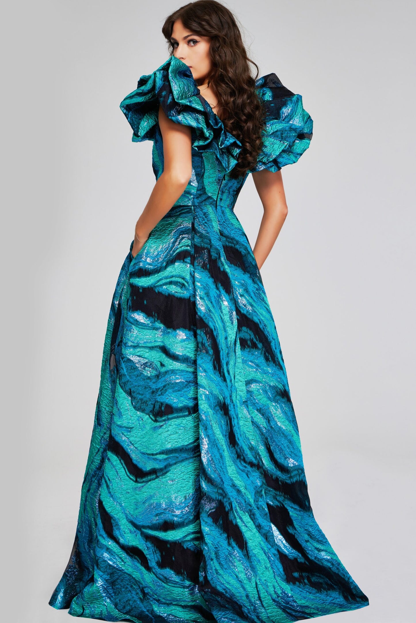 Jovani 40696 Ruffled Cap Sleeve Gown in Teal Multi - Elegant formal gown with a teal multi-color print, featuring dramatic ruffled cap sleeves and a full-length skirt.