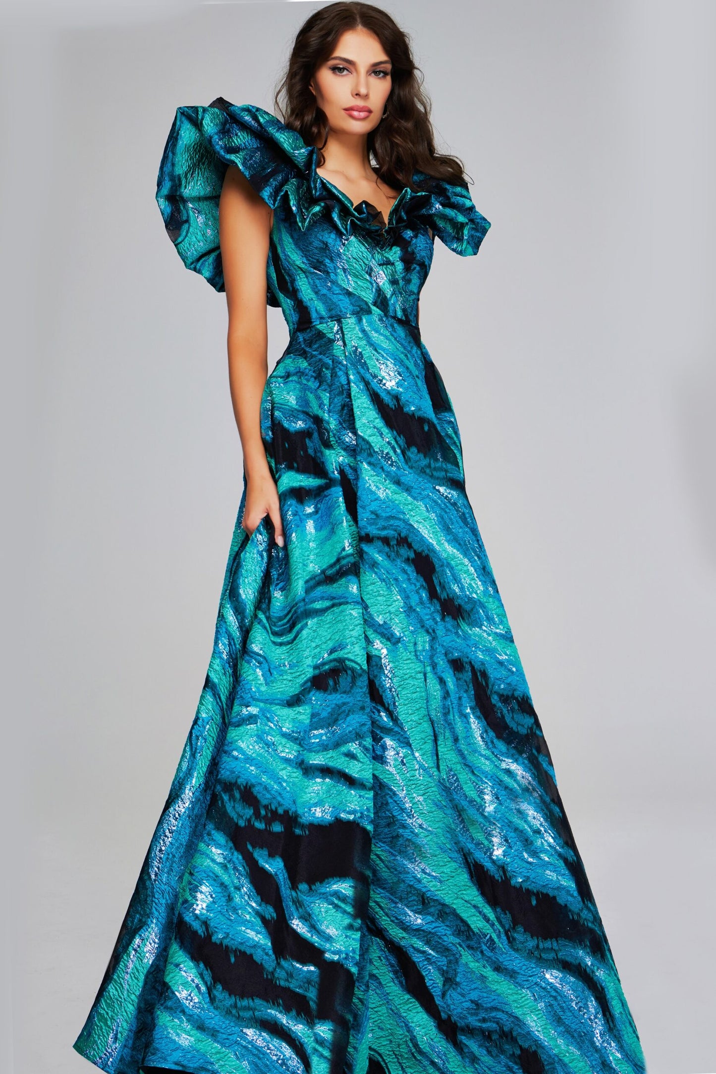 Jovani 40696 Ruffled Cap Sleeve Gown in Teal Multi - Elegant formal gown with a teal multi-color print, featuring dramatic ruffled cap sleeves and a full-length skirt.