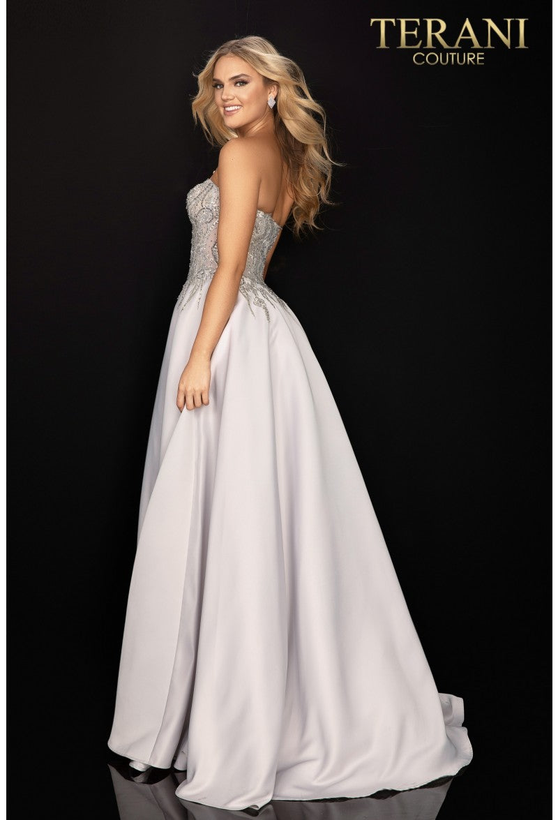 Terani Couture 2011P1197 Strapless Embellished Gown - An elegant prom gown featuring a strapless neckline, embellished bodice, and flowing chiffon skirt in blush-ivory and silver-ivory.