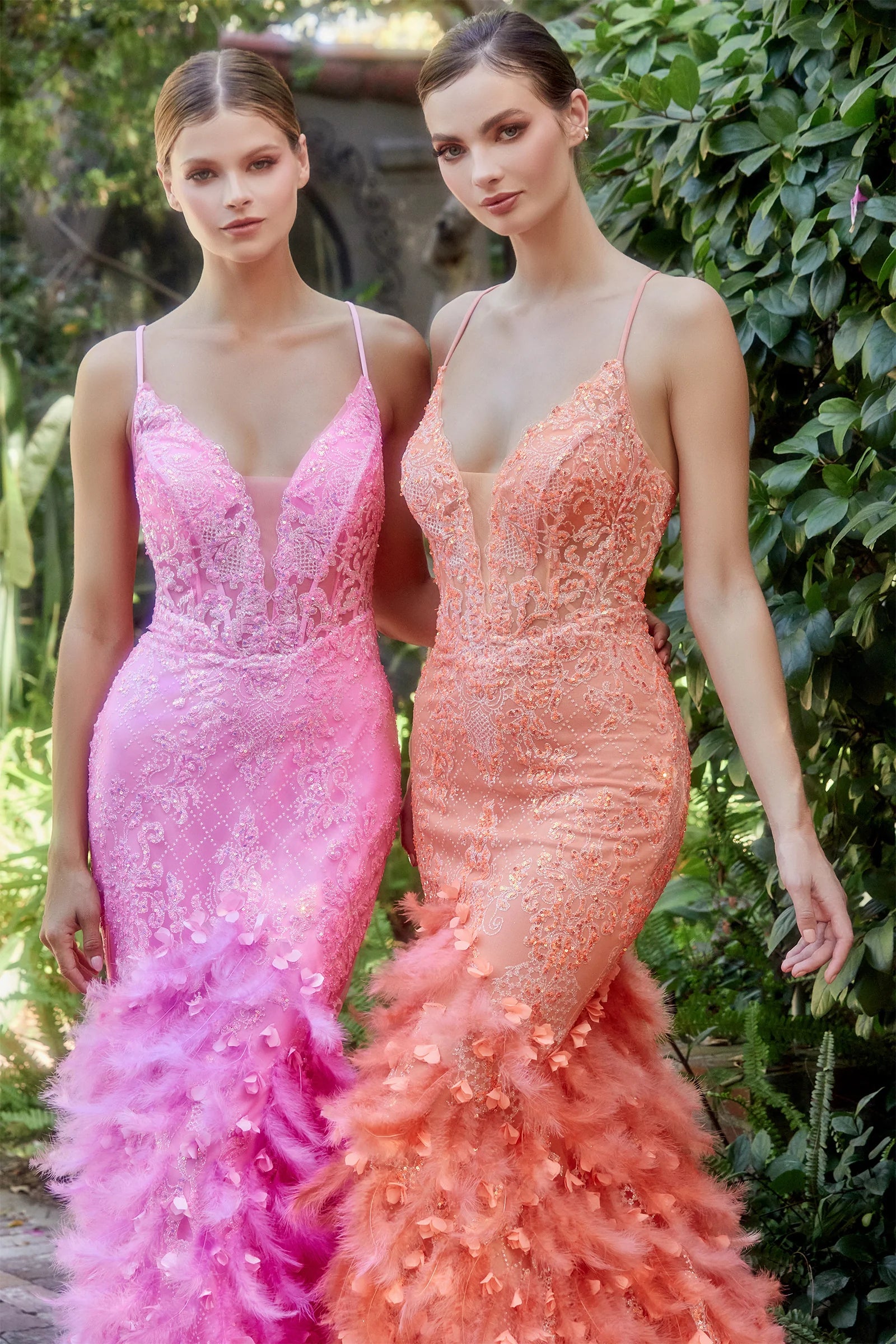 Andrea & Leo A1116 Dress - Floral Beaded Lattice Print Mermaid Gown with Lace-Up Corset, Feathered Lace Train, and Floral Appliques. Perfect for Prom, Pageant, and Red Carpet Events.  Models wearing dresses in Hot Pink and Neon Orange.Dress in Black.