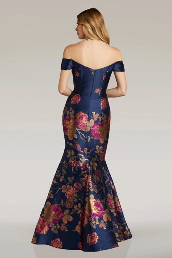 Elegant Feriani Couture evening gown, Style 18338, featuring an off-the-shoulder neckline and floral print on a navy base.  Back view