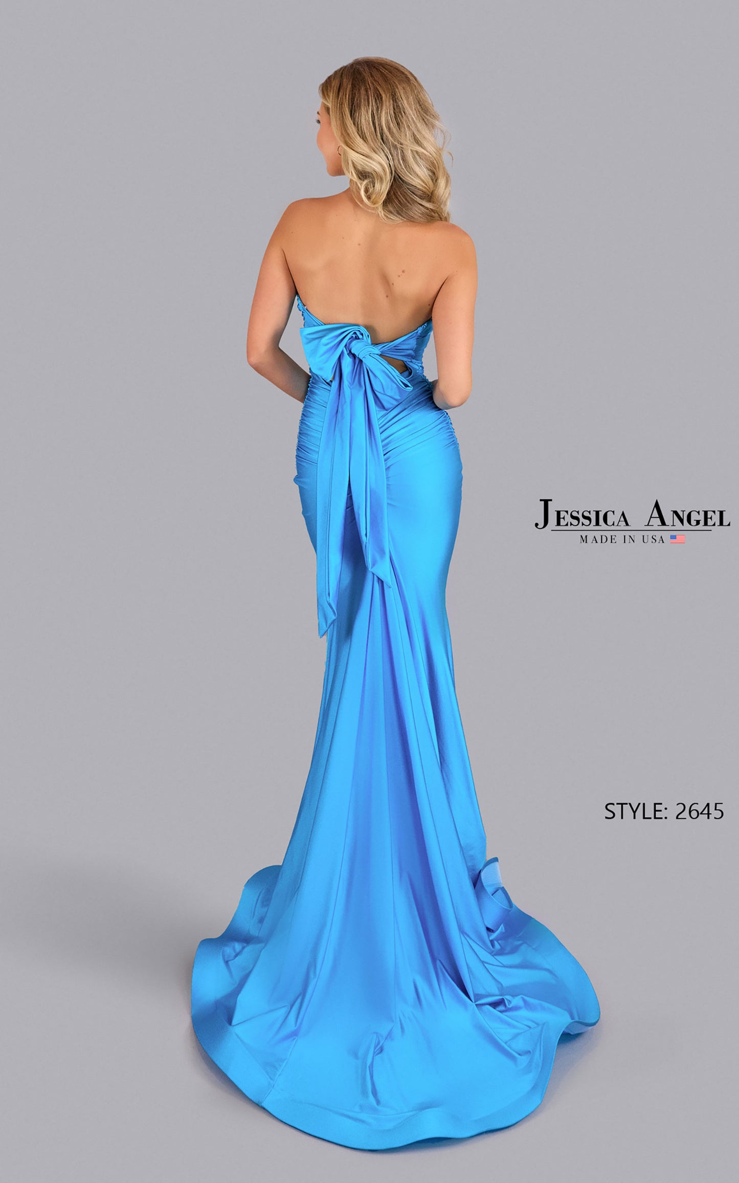 Jessica Angel 2645 strapless gown in blue with ruched bodice and statement bow back, perfect for prom and formal evening occasions.