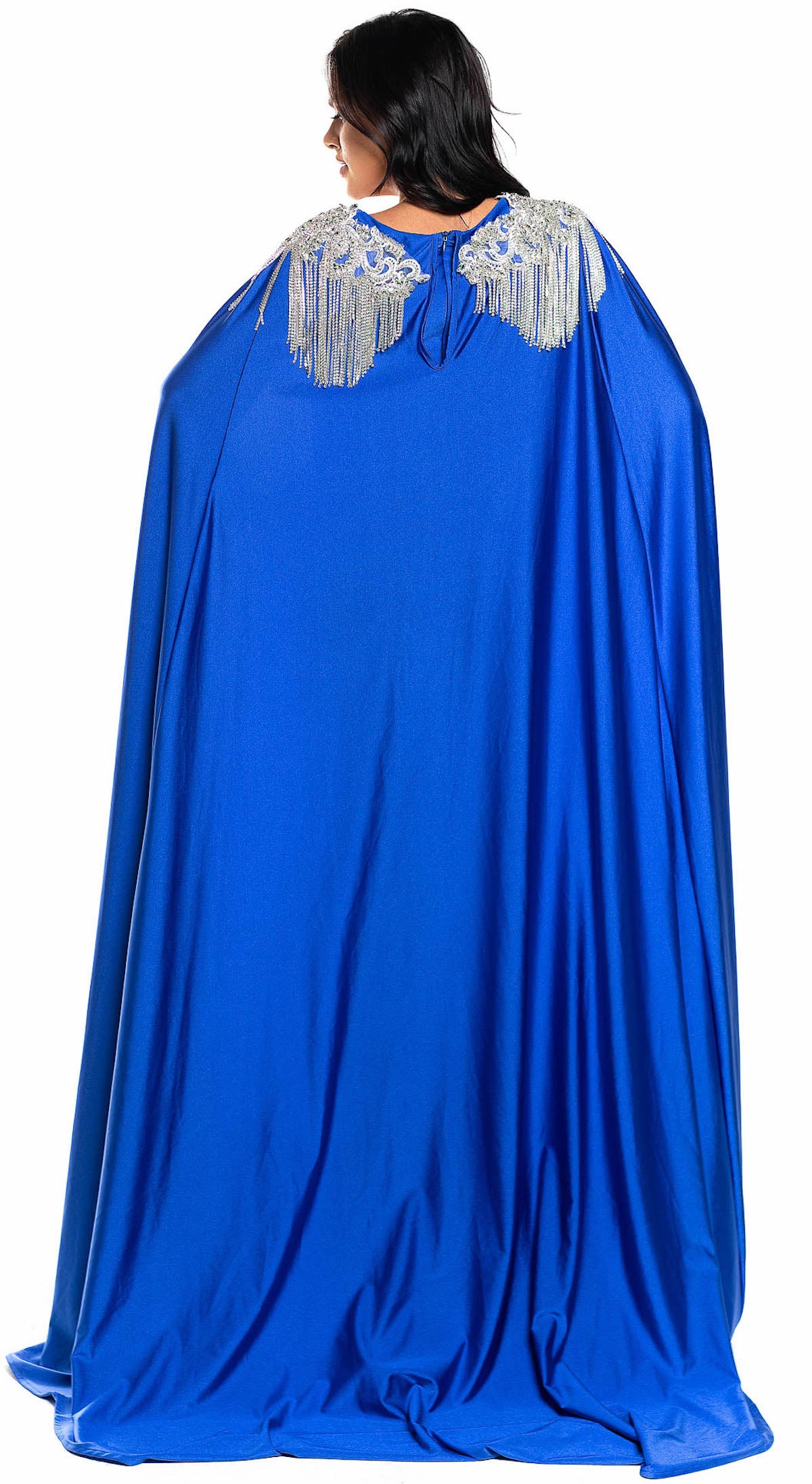 Jessica Angel 896 Jersey Gown in royal blue with embellished shoulders, a deep V-neckline, and a floor-length cape. Ideal for prom and formal events.