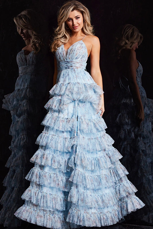 The Jovani Floral Print A-line Gown, a captivating ensemble with a pleated bodice, V-neckline, and a playful ruffle skirt, perfect for proms and formal occasions.  This a picture of the dress in light blue.