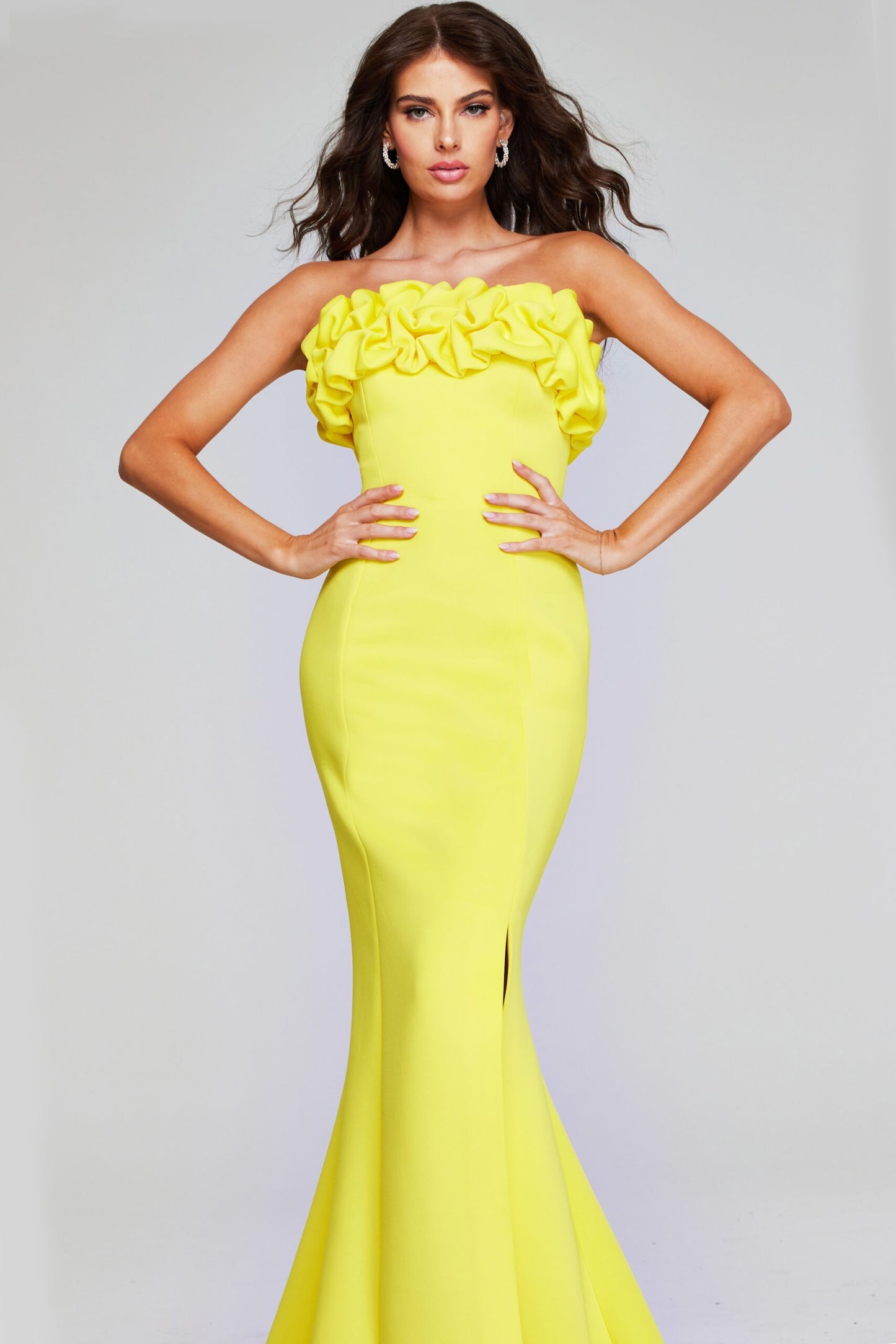 Jovani 38922 Mermaid Silhouette Gown with Ruffles in Yellow – a formal evening gown featuring a mermaid silhouette, high slit, and playful ruffled neckline.