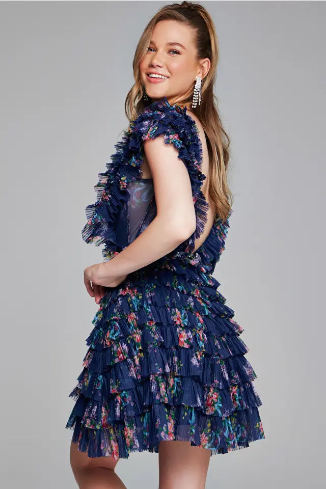 Jovani 50069 navy print Tiered Cocktail Dress - A striking dress with a deep V-neckline, tiered ruffle skirt, and backless design.