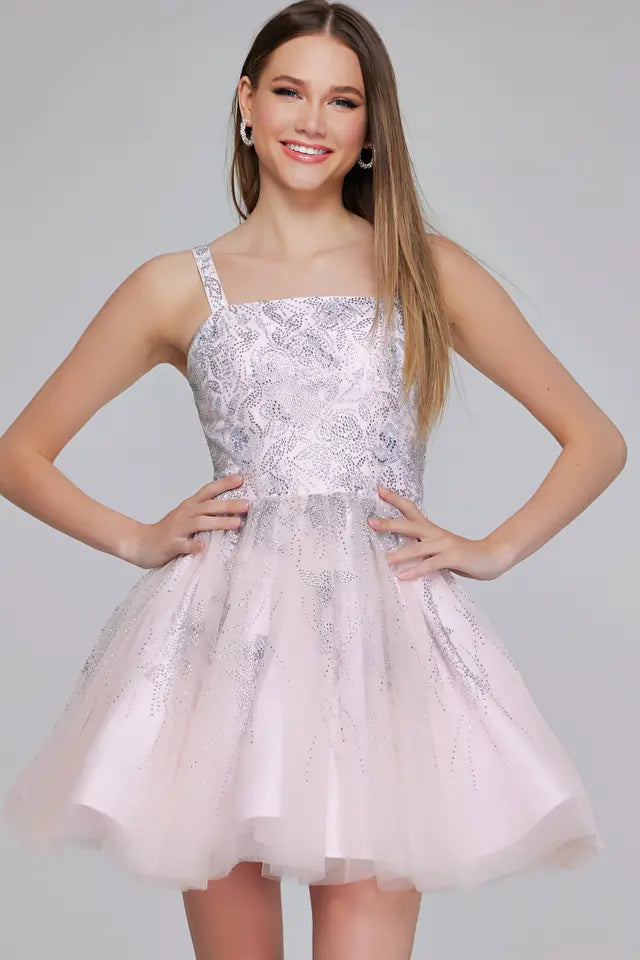 Jovani K22943, a pale pink embroidered tulle mini dress, perfect for young women at graduations or Bat Mitzvahs, featuring intricate detailing and a playful length.