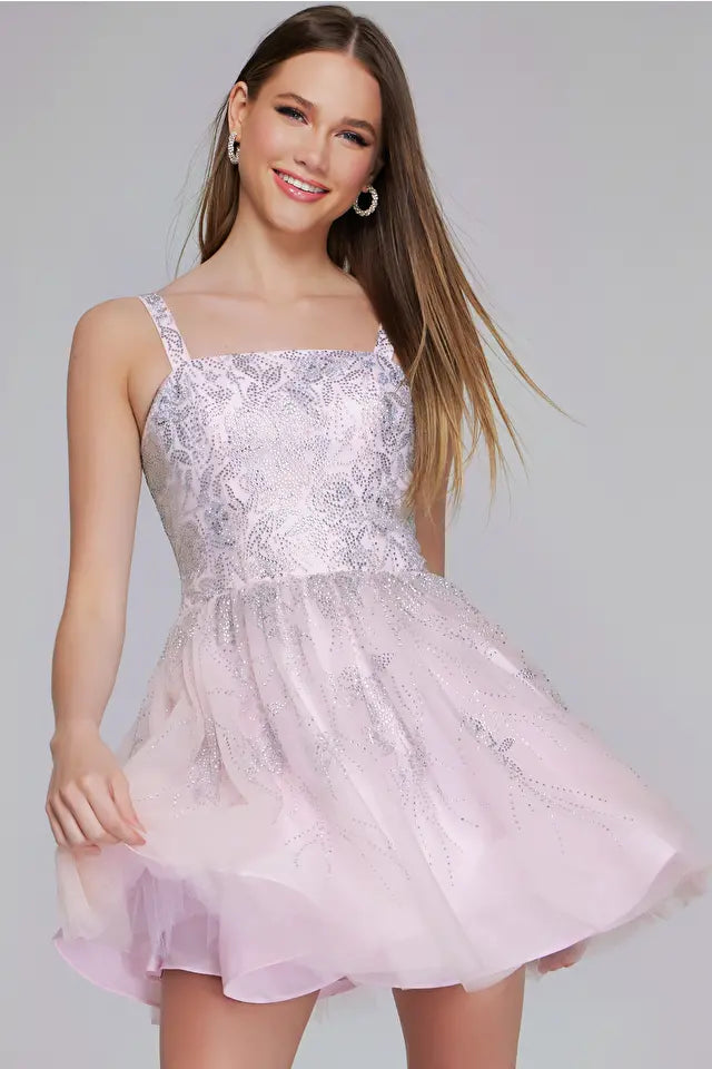 Jovani K22943, a pale pink embroidered tulle mini dress, perfect for young women at graduations or Bat Mitzvahs, featuring intricate detailing and a playful length.