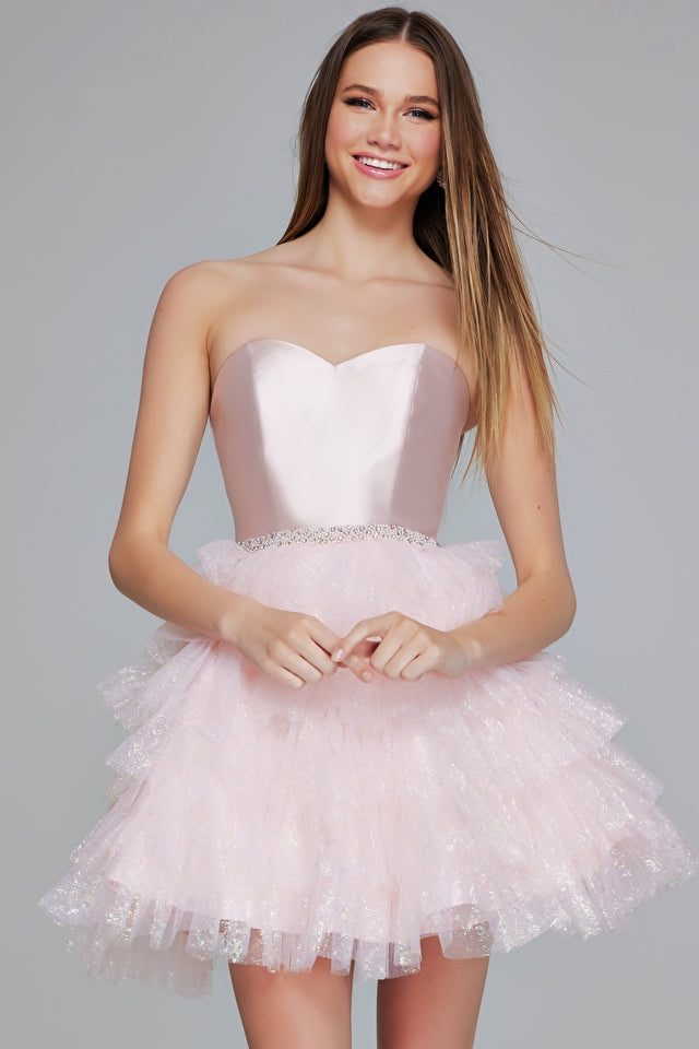 Jovani K39310 Pink Tulle Mini Dress with Sequin Detail - features a strapless sweetheart neckline and a bead embellished waist with a voluminous layered tulle skirt.