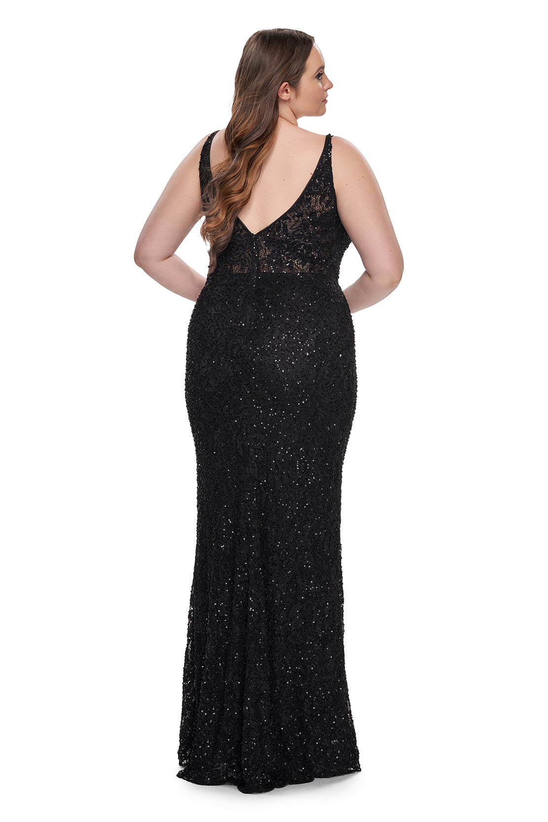 La Femme 31535 Beaded Lace Plus Size Prom Dress - A stunning plus-size prom dress with beaded lace, sheer illusion waist and back detail, square neckline, and fitted stretch fabric for a flattering silhouette. Model is wearing the dress in the color black.