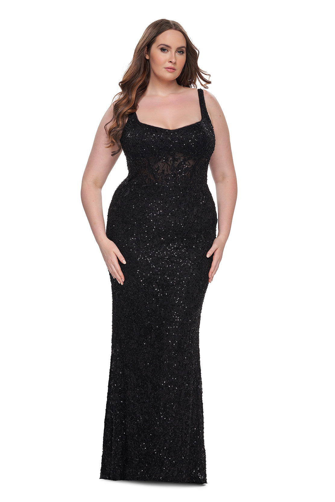 La Femme 31535 Beaded Lace Plus Size Prom Dress - A stunning plus-size prom dress with beaded lace, sheer illusion waist and back detail, square neckline, and fitted stretch fabric for a flattering silhouette. Model is wearing the dress in the color black.