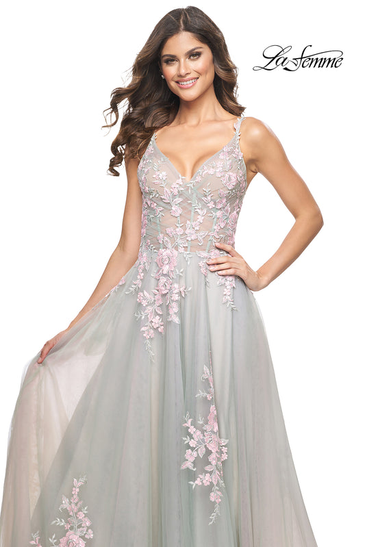 La Femme 31939 Scattered Lace Applique A-Line Prom Gown - An enchanting A-line gown featuring two-color scattered lace applique on tulle, with an illusion waist and boning detail for a magical and captivating prom look.  Model is wearing the dress in the color sage.