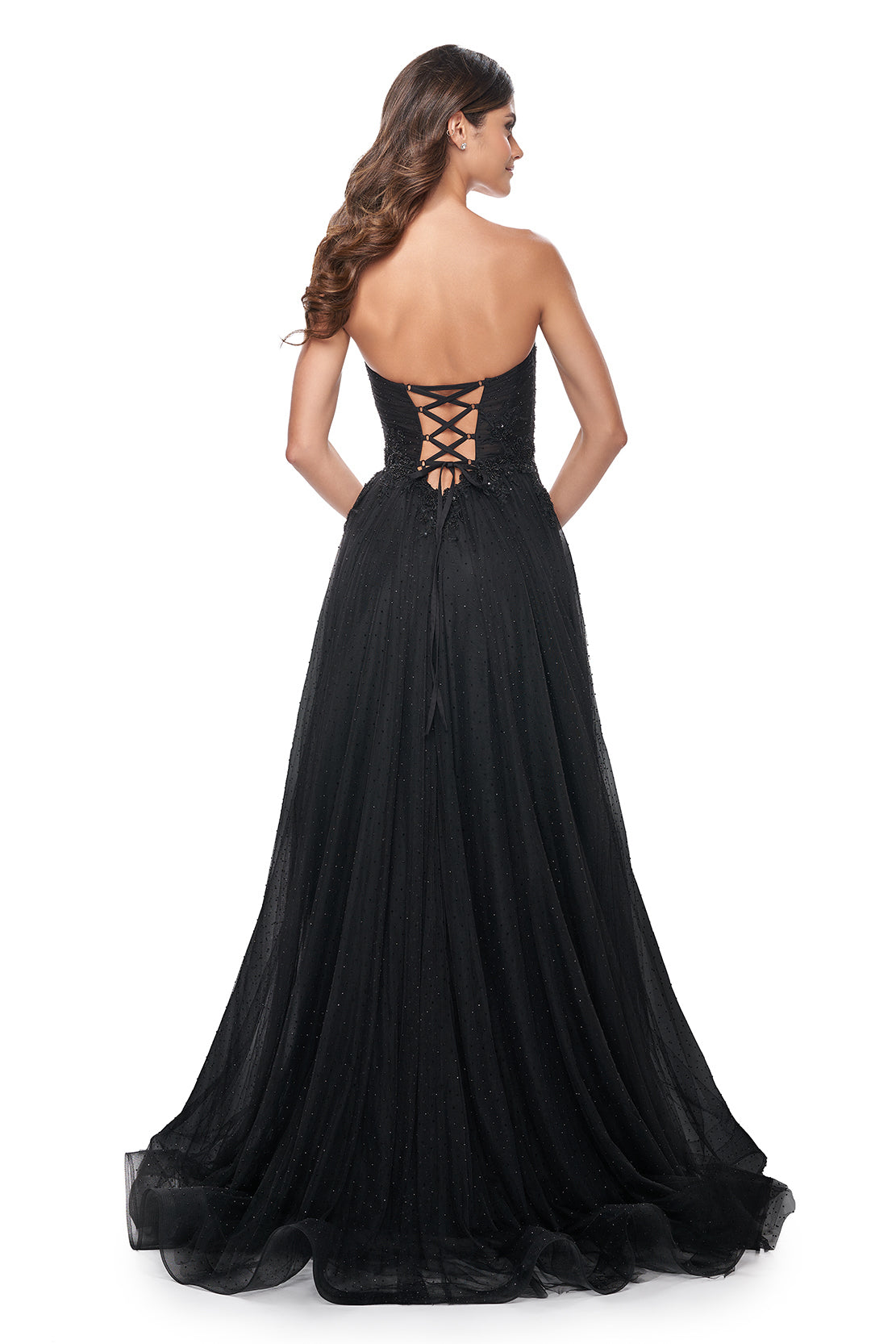 La Femme 32005 Sweetheart Strapless Rhinestone Prom Gown - An enchanting prom gown featuring a sweetheart strapless neckline, rhinestone-embellished tulle, and a ruched illusion bodice with beaded applique detail for a romantic and glamorous look.