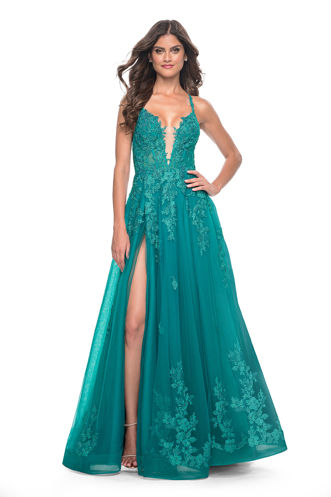 La Femme 32062 A-Line Lace Applique Prom Gown - An enchanting A-line gown featuring a deep v-neck, high slit, lace applique embellished bodice, lace detailed hem, and a charming tie-up back. Perfect for prom or a quinceañera.  Model is wearing teal..