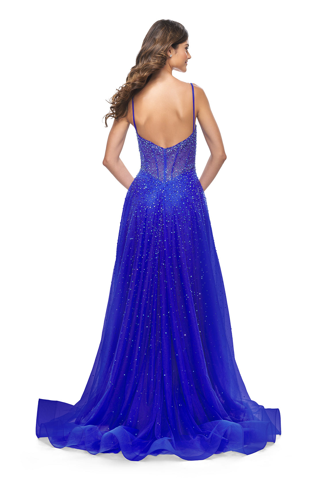 La Femme 32146 Radiant Rhinestone Illusion A-Line Prom Gown - An enchanting prom gown featuring radiant large rhinestones, an alluring illusion bustier bodice, and a V neckline for a dazzling and sophisticated look.  The model is wearing royal blue.