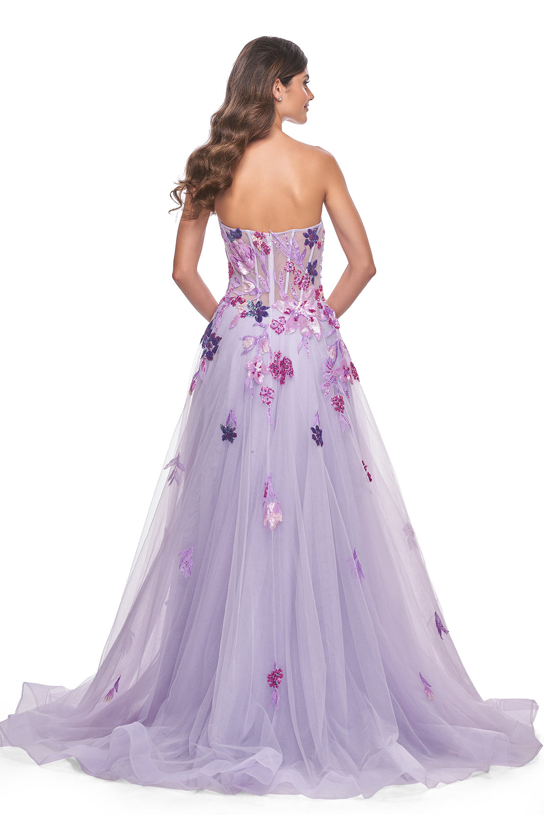 La Femme 32156 Strapless A-Line Tulle Prom and Quinceañera Dress - A captivating A-line tulle dress featuring a strapless design and floral multicolor sequin lace applique details, perfect for making a statement at prom or quinceañera celebrations. The model is wearing the dress in the color Lavender.