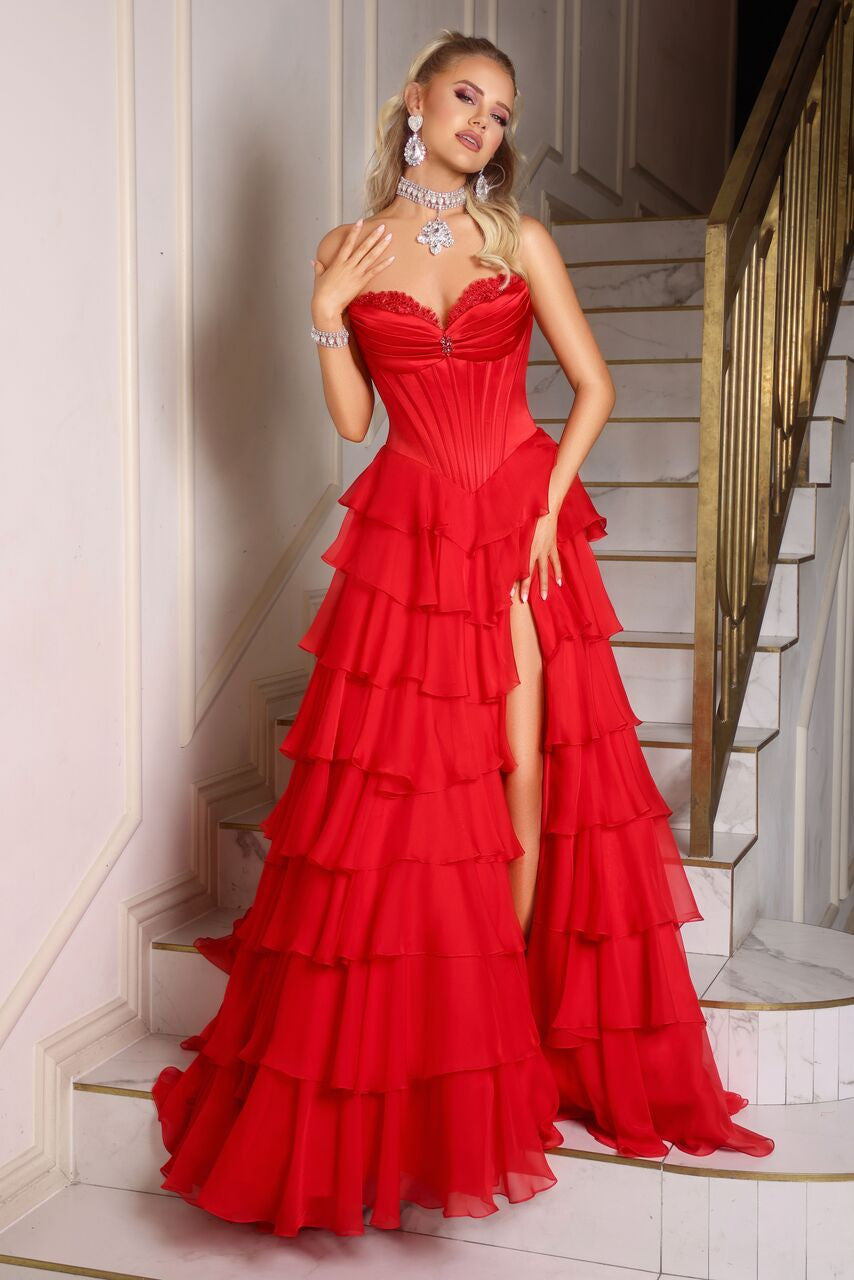 Portia & Scarlett PS25963 Strapless Ruffled High-Slit Gown featuring a corset bodice, sweetheart neckline with lace trim, tiered ruffle skirt, high slit, and lace-up back.