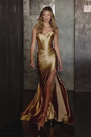 A chic strapless sweetheart evening gown by Sherri Hill, made from silky stretched jersey fabric, featuring a corset bodice, ruching, and a skirt slit.  This is a video of the model wearing the dress by Sherri Hill.