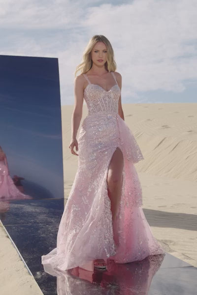 Sherri Hill 56589 sequin corset gown in pink with ruffle overskirt and high slit, perfect for prom and formal evenings.  This is a video of the model wearing the dress.