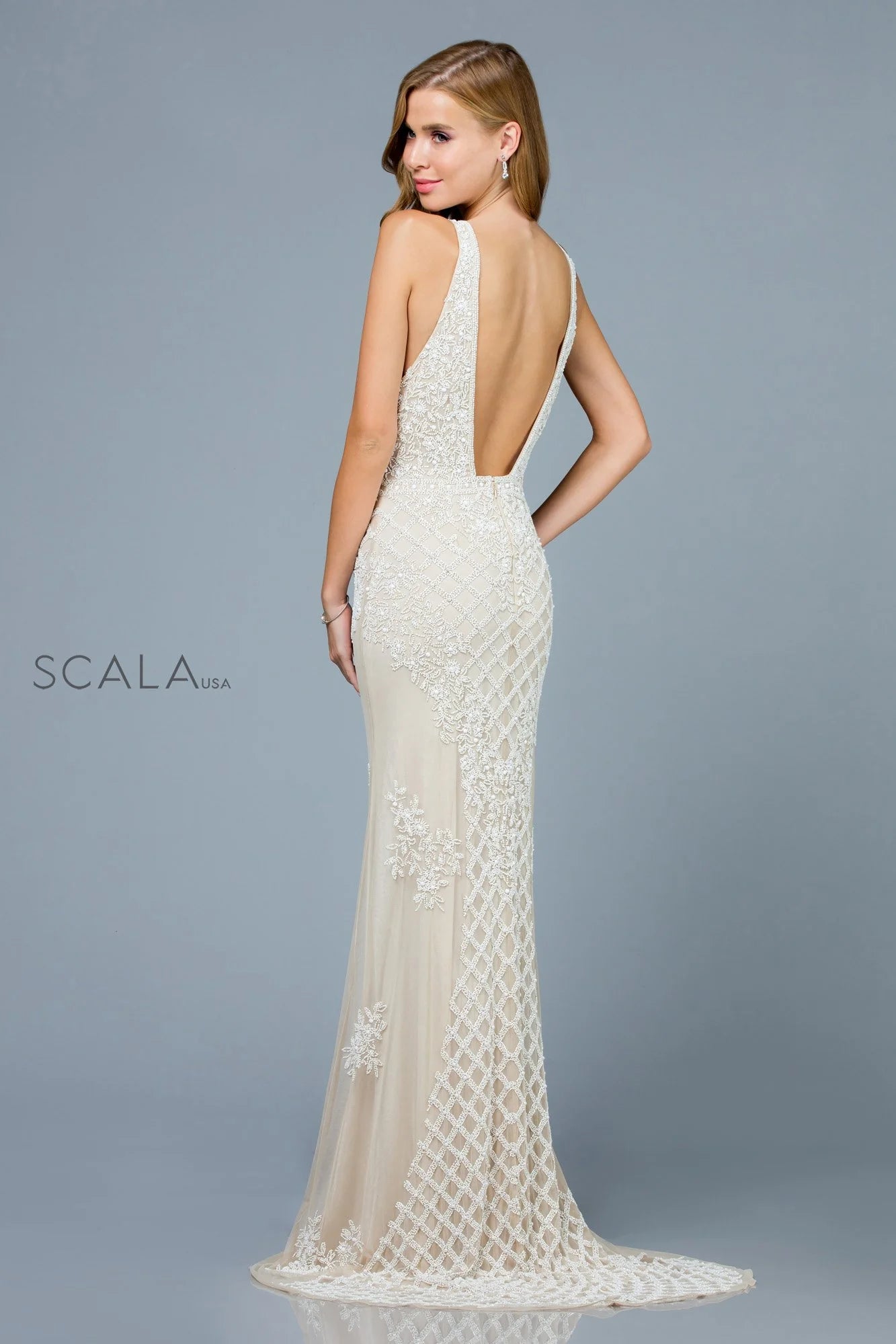 Scala 50770 Embellished Plunge Formal Gown featuring a deep V-neckline, intricate beadwork and embroidery, fitted bodice, and a low back design.