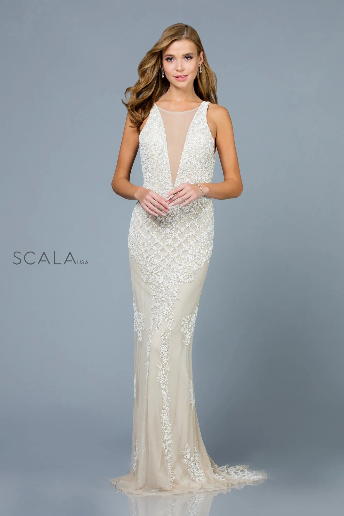 Scala 50770 Embellished Plunge Formal Gown featuring a deep V-neckline, intricate beadwork and embroidery, fitted bodice, and a low back design.