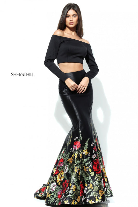 Sherri Hill 50770 Long Sleeve Two-Piece Satin Mermaid Dress featuring an off-the-shoulder crop top and a floral border on the mermaid skirt.