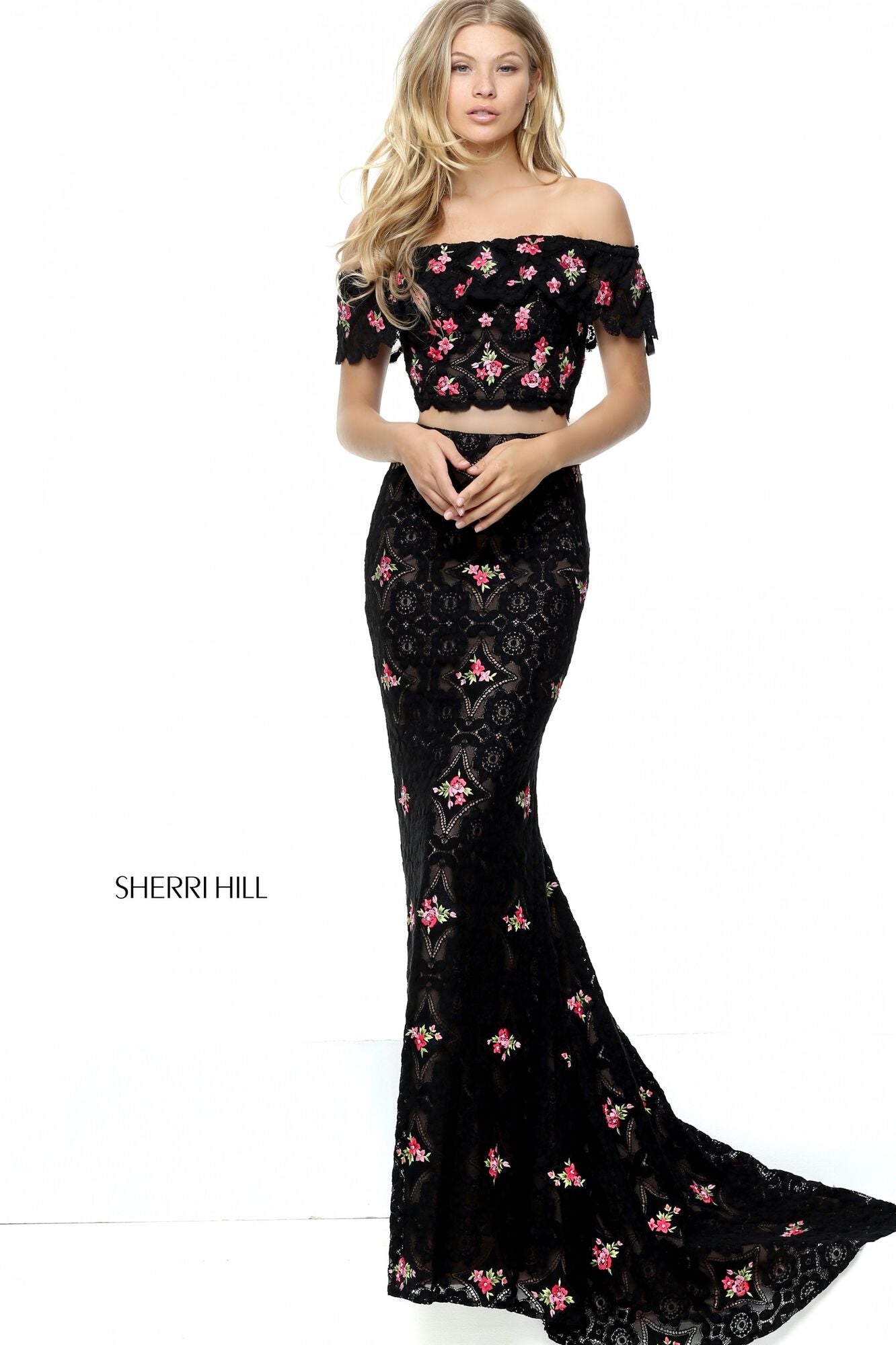 Sherri Hill 50785 Crochet Two-Piece Mermaid Gown - A sophisticated ensemble with an off-the-shoulder bodice and fitted mermaid skirt in intricate crochet, perfect for formal occasions.