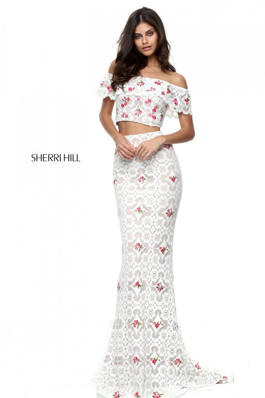 Sherri Hill 50785 Crochet Two-Piece Mermaid Gown - A sophisticated ensemble with an off-the-shoulder bodice and fitted mermaid skirt in intricate crochet, perfect for formal occasions.