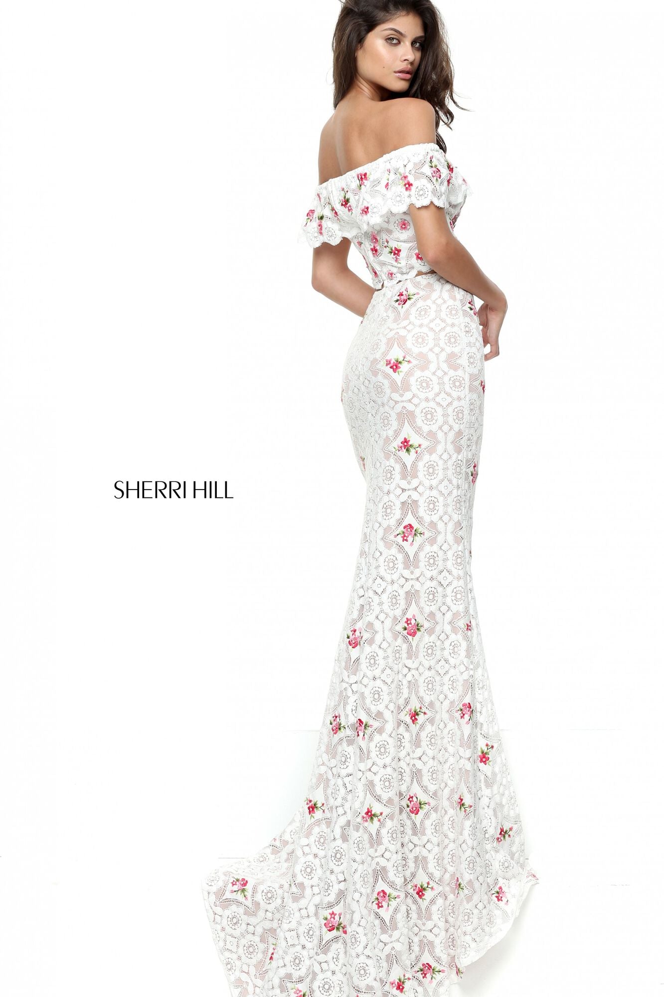 Sherri Hill 50785 Crochet Two-Piece Mermaid Gown - A sophisticated ensemble with an off-the-shoulder bodice and fitted mermaid skirt in intricate crochet, perfect for formal occasions.