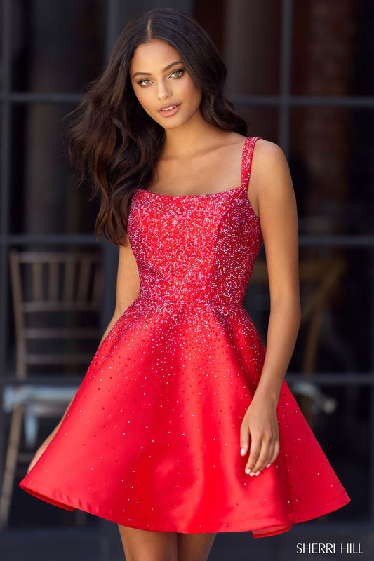 A-line mikado cocktail dress by Sherri Hill, adorned with hot fix detailing and featuring an open back. Ideal for cocktail parties, graduations, homecoming, and Bat Mitzvahs.