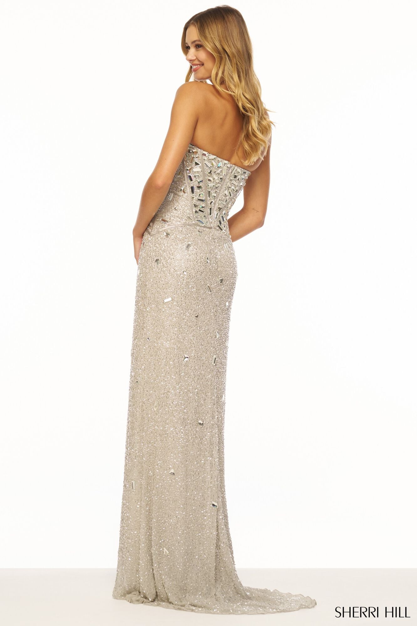 Sherri Hill 56175 Stunning Strapless Liquid Beaded Formal Evening Gown - A breathtaking gown featuring a strapless design, fitted silhouette, and exquisite cut glass embellishments on a liquid beaded fabric. Back View