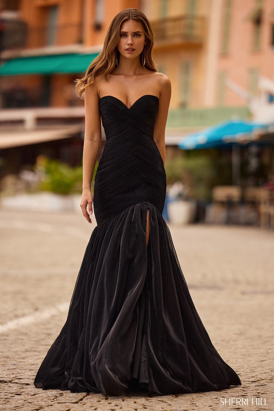 Sherri Hill 57074 strapless mermaid metallic mesh gown with a skirt slit in black, perfect for formal evenings or prom.