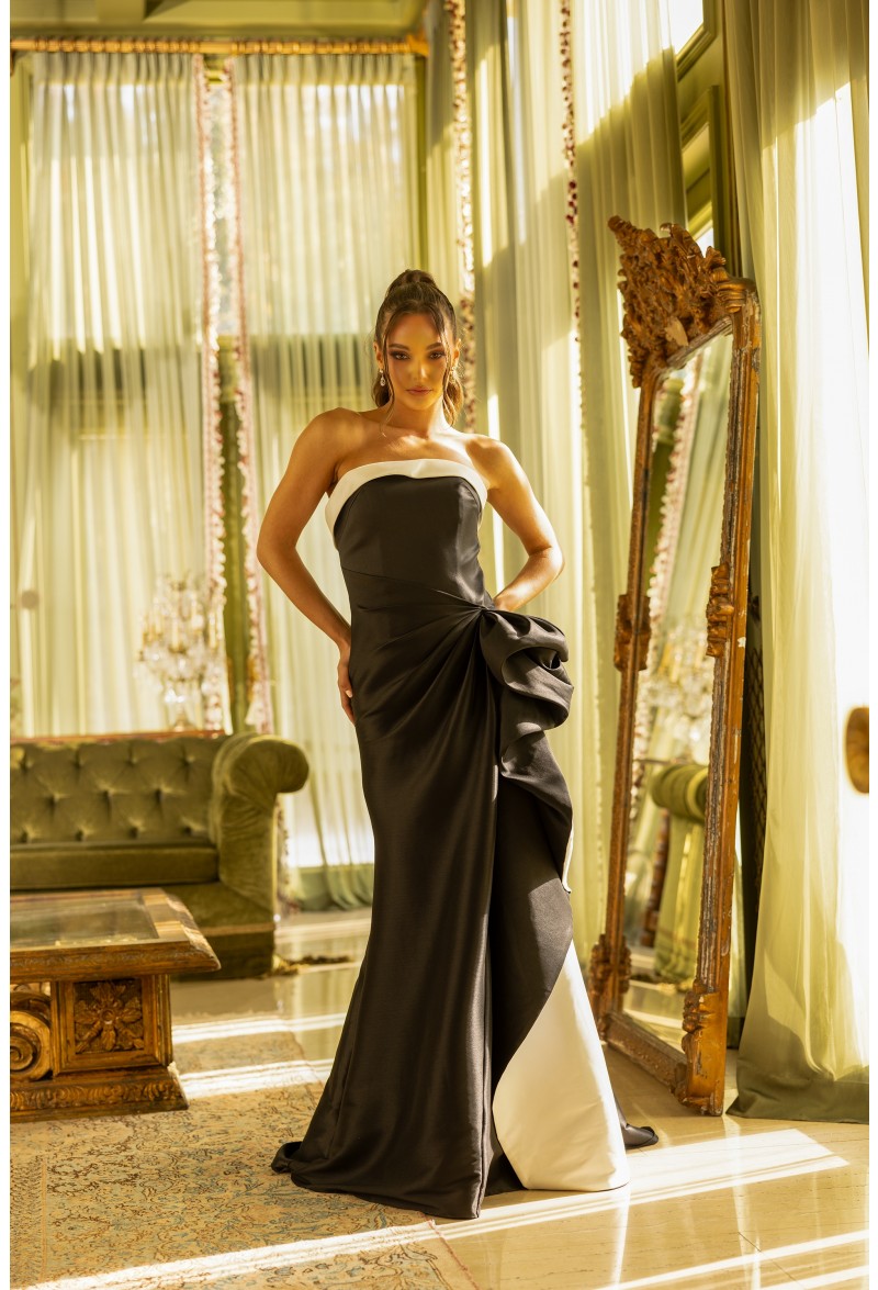 Terani Couture 242E3151 Black and White Evening Gown - A sophisticated gown with a fitted bodice, mermaid skirt, and elegant black and white detailing.